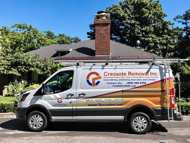 Huntington Beach Chimney Sweep technician removing creosote safely in Huntington Beach, CA